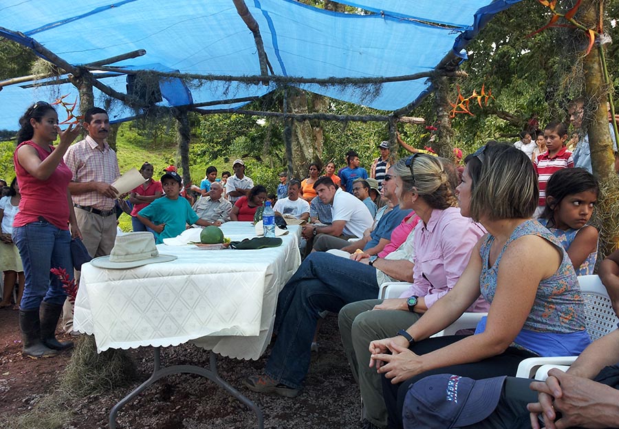 ELM attorneys, seated at right, listen to a presentation given by the community of Tierra Nueva, a village near Agroaldea San José.